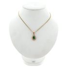 Image 3 of Gold pendant with emerald and diamonds; 0.32 ct.