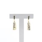 Image 1 of Gold earrings with meander pendant.