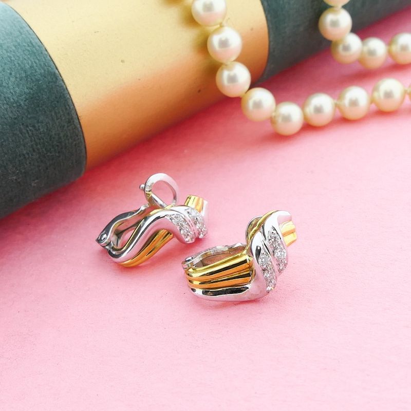 Image 2 of Bicolor gold fantasy stud earrings with diamonds; 0.15 ct.