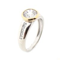 Two-tone gold ring with zirconia stones