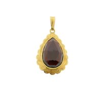 Vintage gold pendant with garnet.