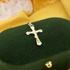 Image 2 of Gold pendant of a cross with corpus.