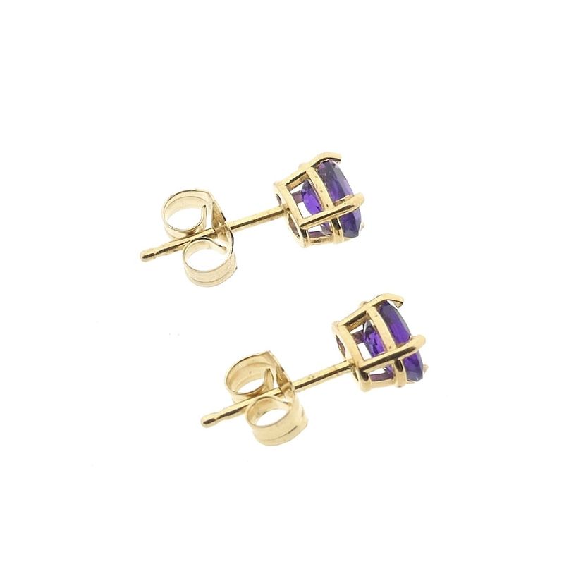 Image 10 of Gold stud earrings with synthetic purple gemstone