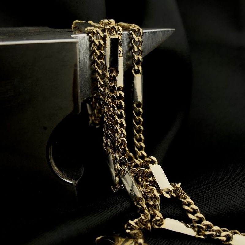 Image 2 of Two-tone gold Figaro/gourmet link chain