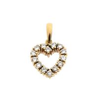 Gold pendant in the shape of a heart with diamonds; 0.49 ct.