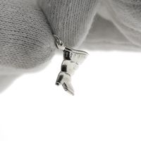 Silver charm of a boot