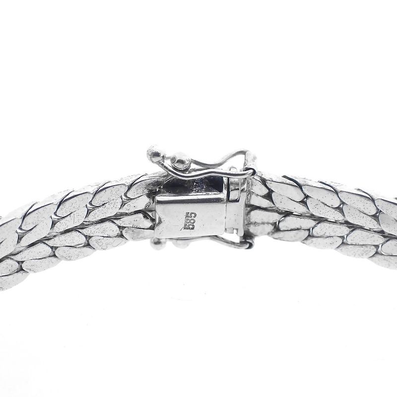 Image 9 of White gold herringbone link bracelet with 0.525 ct diamonds.