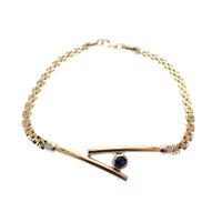 Two-tone gold Bismarck link bracelet with sapphire