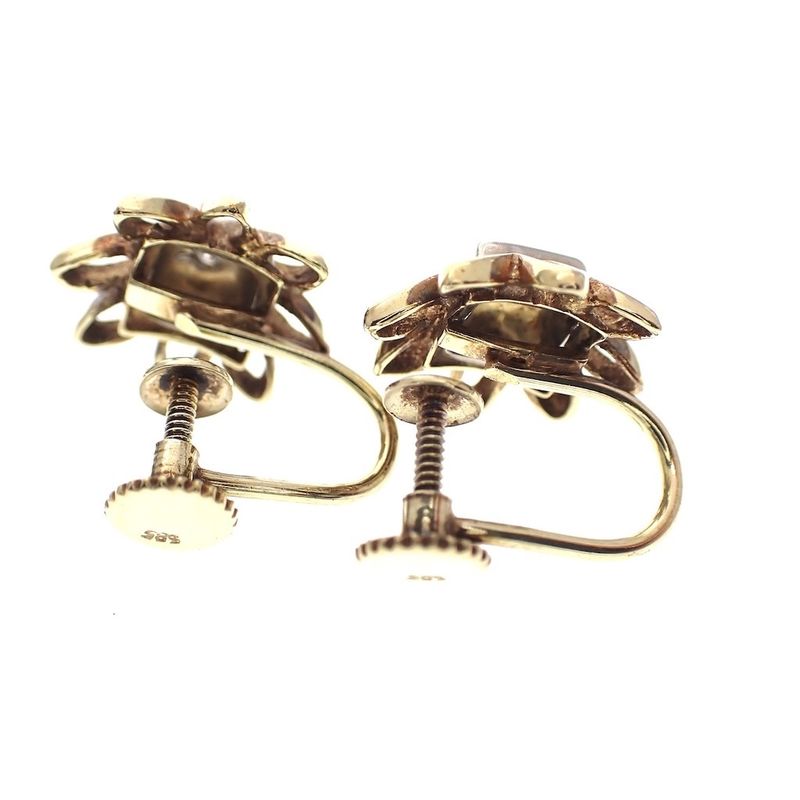 Image 3 of Two-tone gold vintage clip-on earrings with a floral design | 0.06 ct diamond.