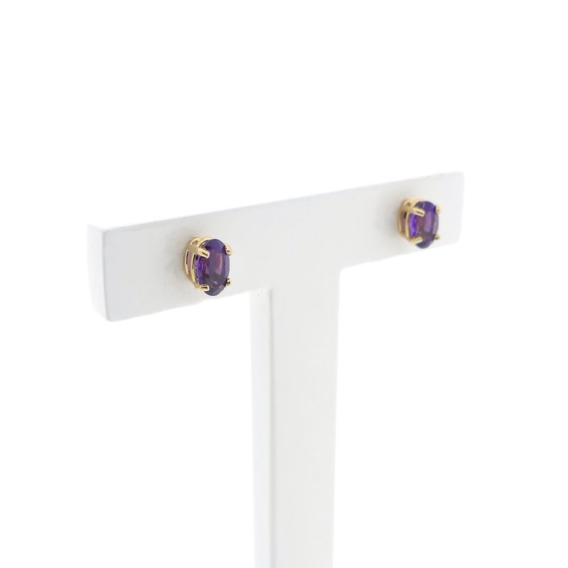 Image 3 of Gold stud earrings with synthetic purple gemstone