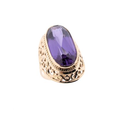 Image 1 of Antique gold ring with synthetic purple sapphire.