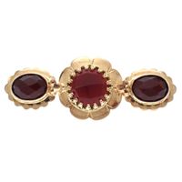 Vintage gold brooch with carnelian
