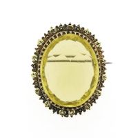 Antique gold brooch with Heliodor
