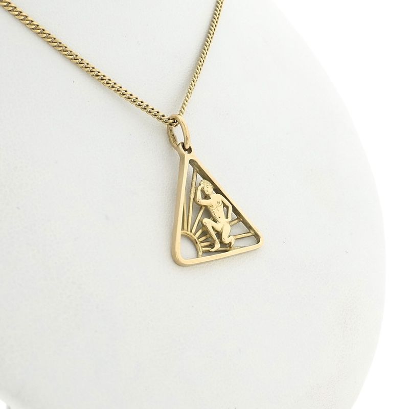 Image 7 of Gold pendant of the naturist symbol