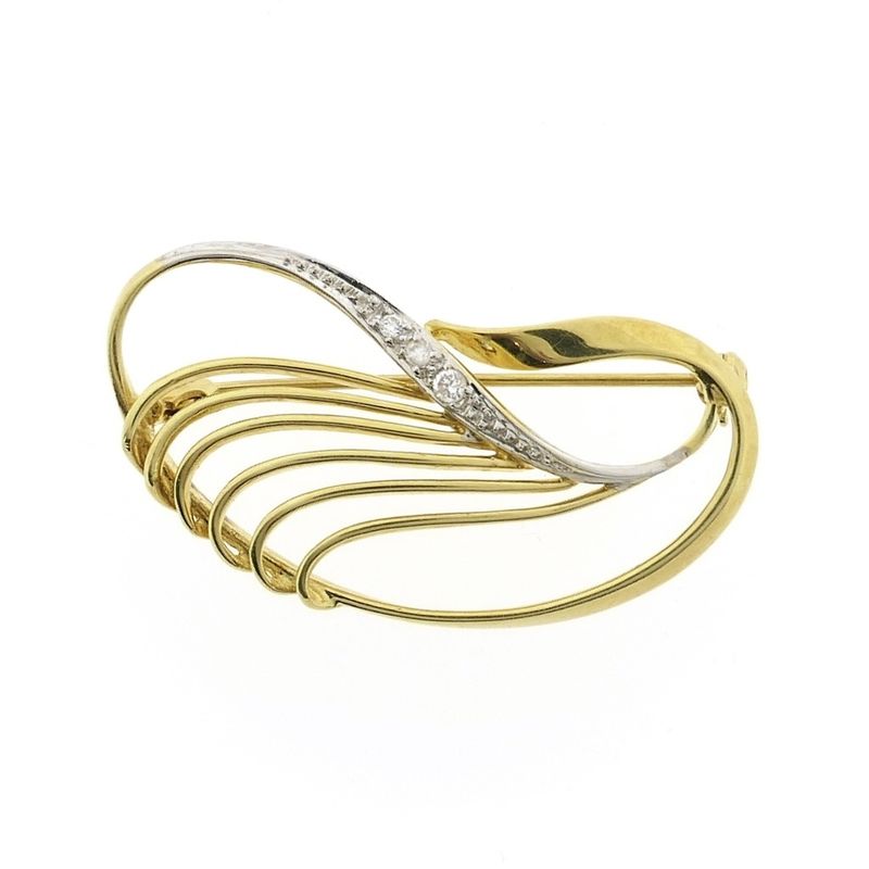 Image 1 of Two-tone gold brooch with zirconia.