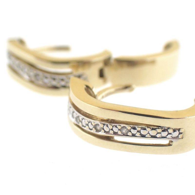 Image 7 of Two-tone gold hoop earrings with diamonds | 0.03 ct.