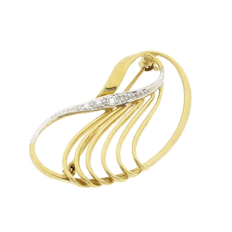 Image 11 of Two-tone gold brooch with zirconia.