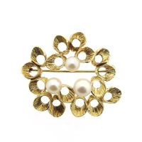 Vintage gold fantasy brooch with pearls