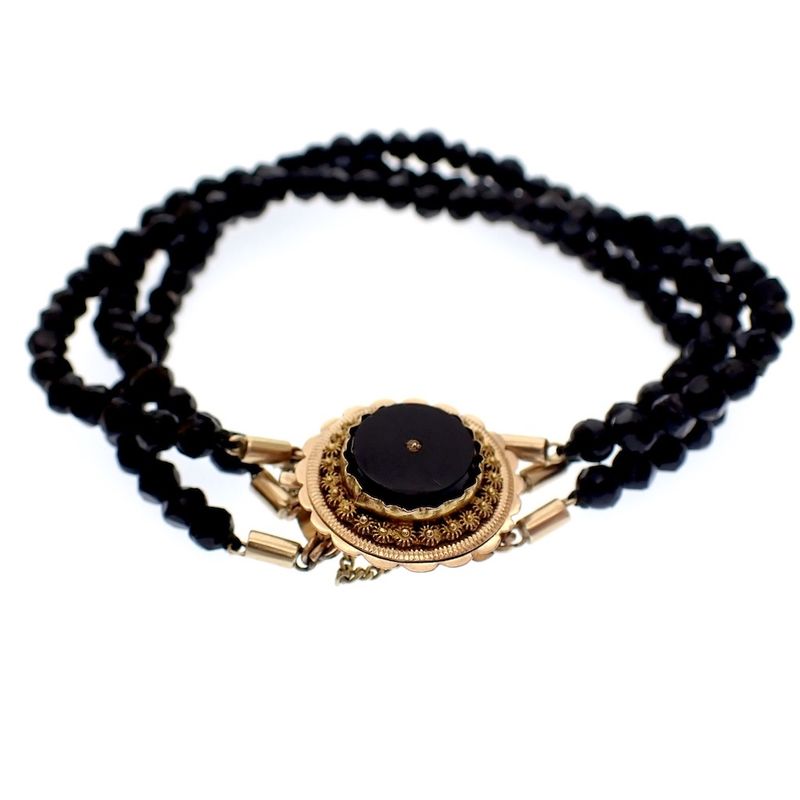 Image 1 of Antique bracelet with onyx and gold decorative clasp