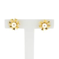 Gold floral stud earrings with pearl