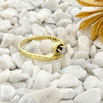 Image 2 of Golden solitaire ring with diamond; 0.11 ct.