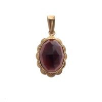 Vintage gold pendant with garnet