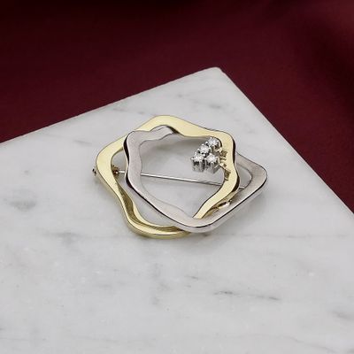 Afbeelding 2 van Bicolor gouden broche met diamanten; 0,06 ct. 