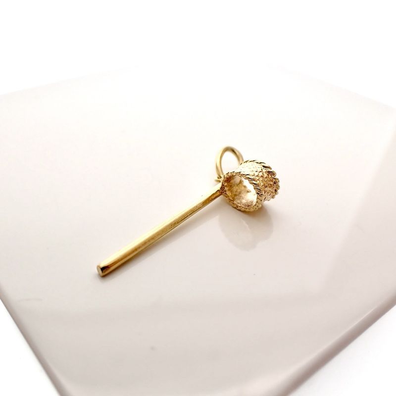 Image 3 of Gold pendant of a korfball post