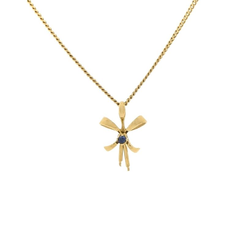 Image 8 of Gold pendant with a bow and sapphire