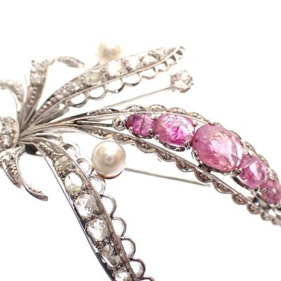 White gold floral brooch set with spinel, pearl and diamond 0.57 ct. Image 2 of White gold floral brooch set with spinel, pearl and diamond 0.57 ct.