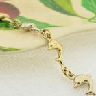 Image 7 of Two-tone gold dolphin bracelet