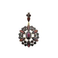 Vintage gold entourage pendant with garnet