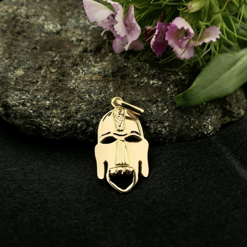 Image 2 of 18 carat gold pendant of a mask