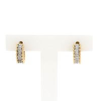 Bicolor gold earrings with diamonds; 0.10 ct.