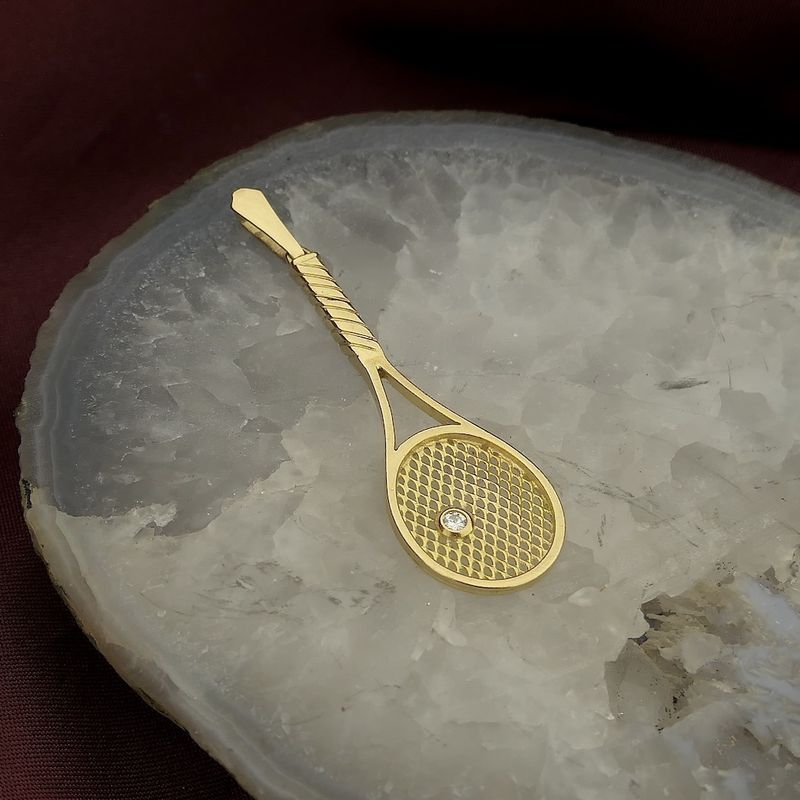 Image 8 of Gold pendant of a tennis racket with diamond; 0.04 ct.
