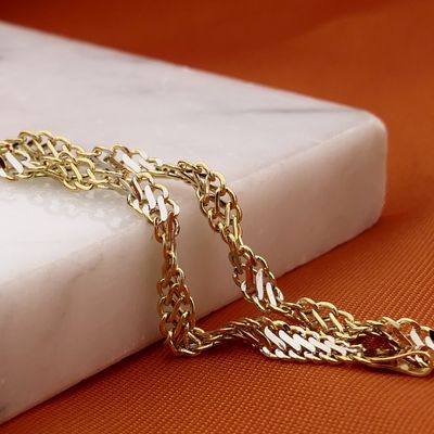 Afbeelding 2 van Bicolor gouden gedraaide armband | 19,5 cm