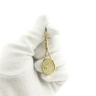 Image 7 of Gold pendant of a tennis racket with diamond; 0.04 ct.