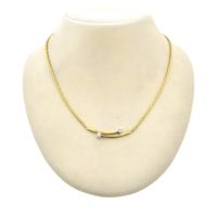 Gold cobra link necklace with diamond; 0.32 ct.