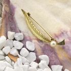 Image 2 of Vintage gold brooch as a feather with pearl