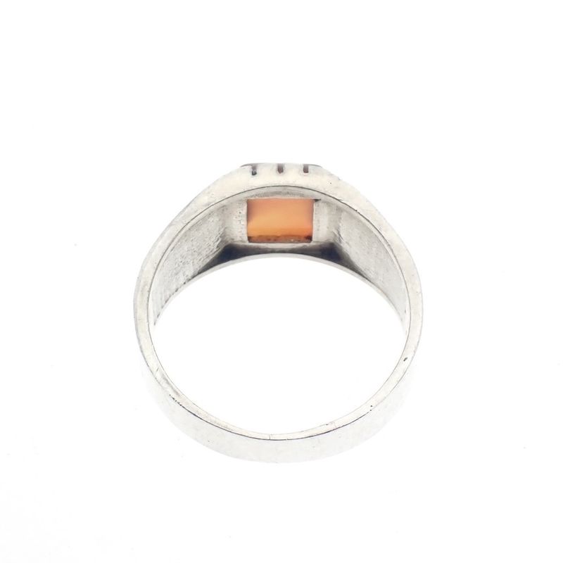 Image 9 of Silver ring with orange zirconia and Maori pattern