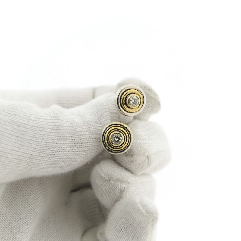 Image 11 of Bicolor gold stud earrings with diamond; 0.28 ct.