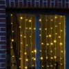 Afbeelding van Kerstverlichting lichtgordijn/ijspegellichtjes voor het raam met 120 lichtjes warm wit 100 x 200 cm