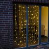 Afbeelding van Kerstverlichting lichtgordijn/ijspegellichtjes voor het raam met 120 lichtjes warm wit 100 x 200 cm