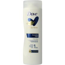 Foto van Dove Body milk essential nourishment