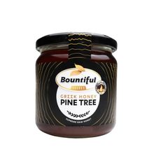 Foto van Bountiful Select Griekse rauwe honing pine tree/dennen