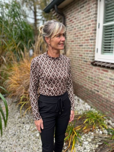 Foto van Perla Nera col top camel