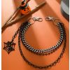 Afbeelding van Zacharia | 3 dubbele zwarte-heupketting met spinnenweb en clips