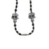 Afbeelding van Zacharia | Halsketting met dubbele Sugar skull en zwarte kralen 