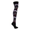 Afbeelding van Macahel | Overknee sokken zwart met witte Punk Not Dead skulls