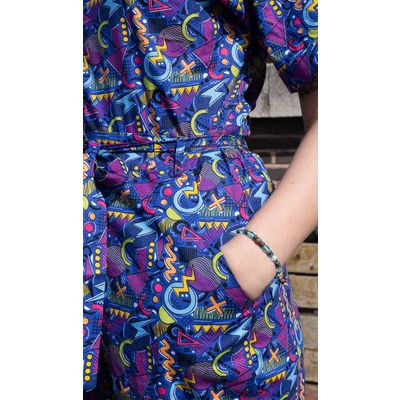 Foto van Run & Fly | Jumpsuit met 90's Arcade print